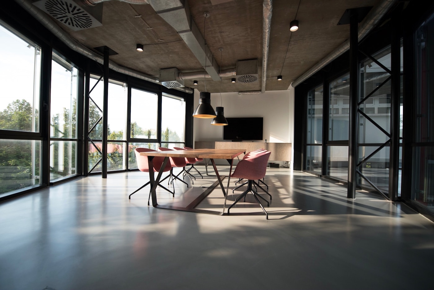Modern open-plan marketing agency office with natural light near Clarke Quay Singapore